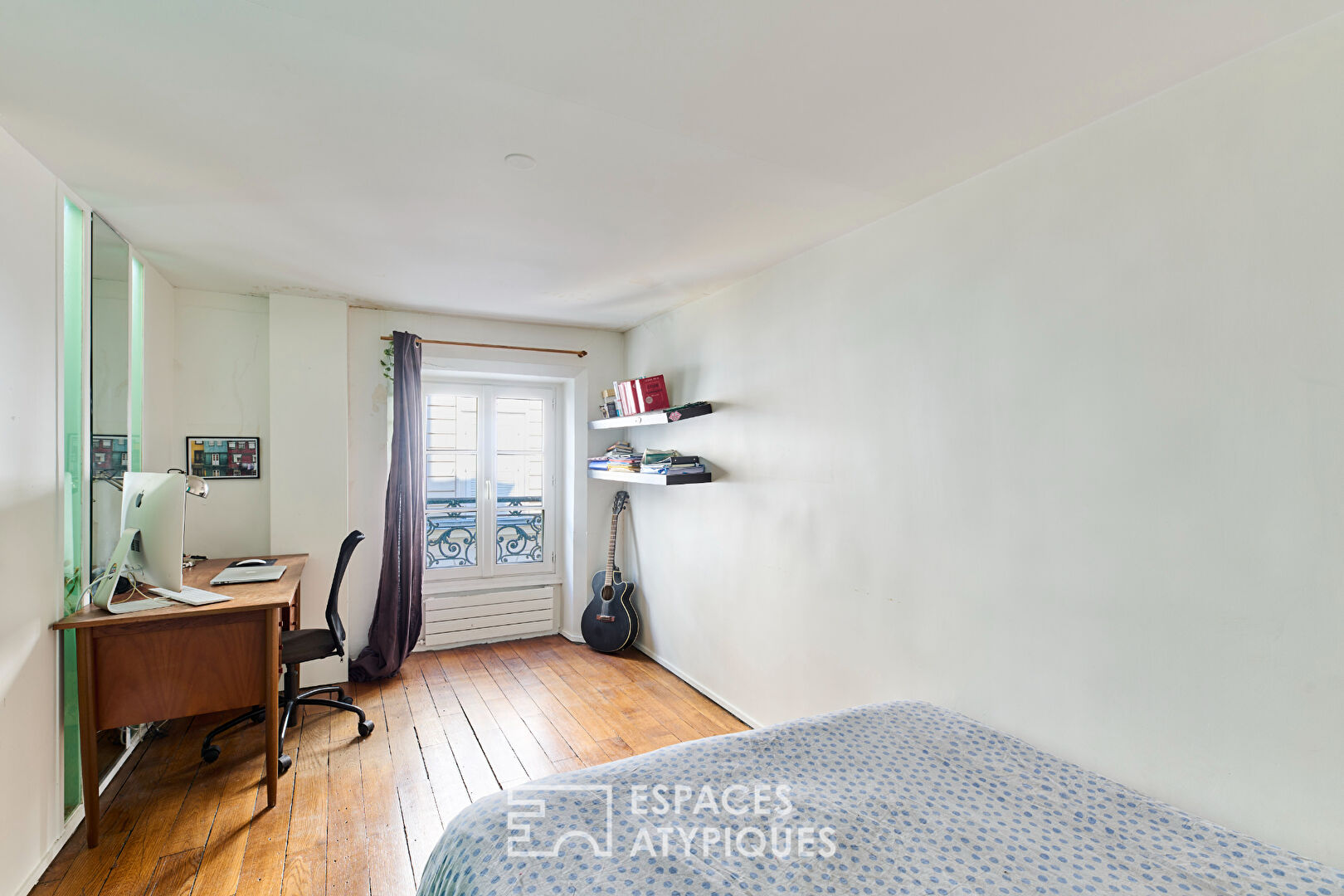 Ancien studio de danse transformé par un architecte en loft familial proche Martyrs
