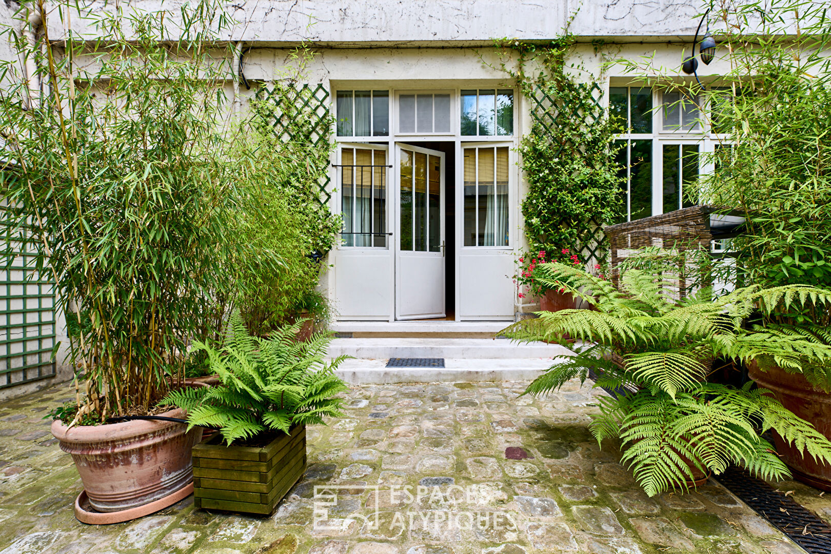 Duplex esprit maison avec studios et terrasse au coeur de Montorgueil