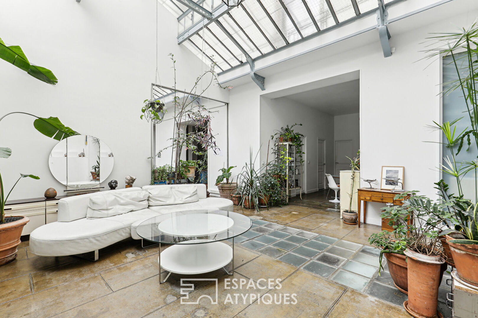 Loft d’habitation et local commercial avec verrière Eiffel proximité square d’Anvers