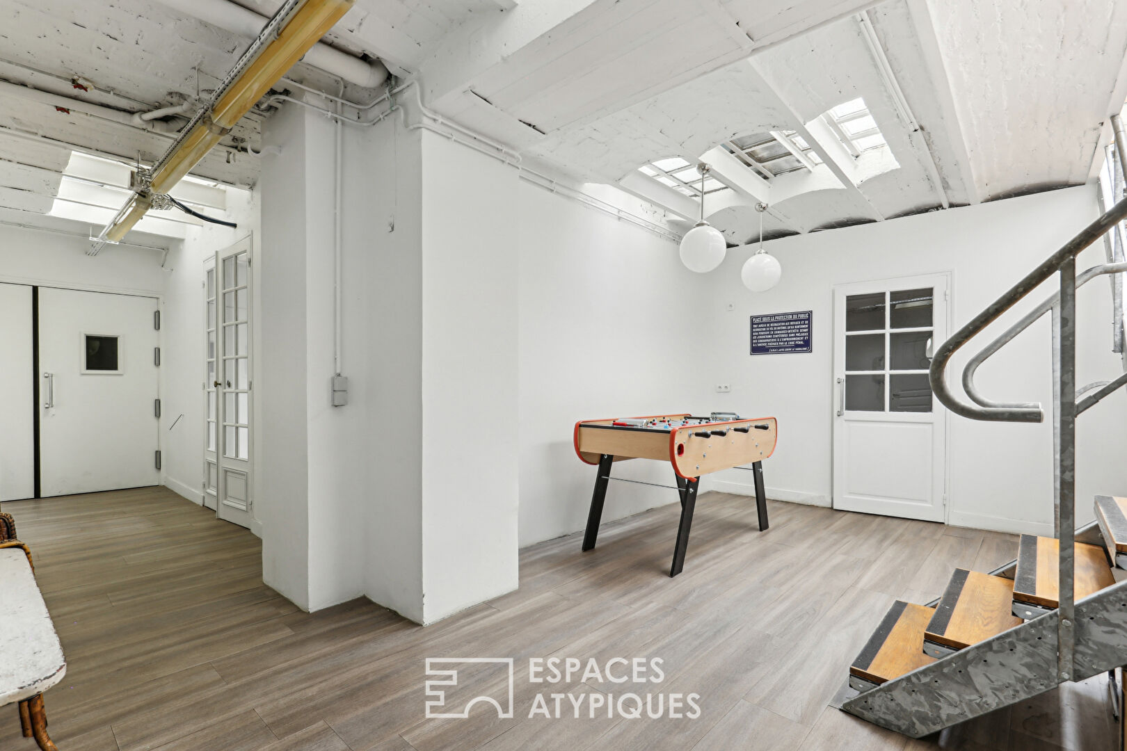 Loft d’habitation et local commercial avec verrière Eiffel proximité square d’Anvers