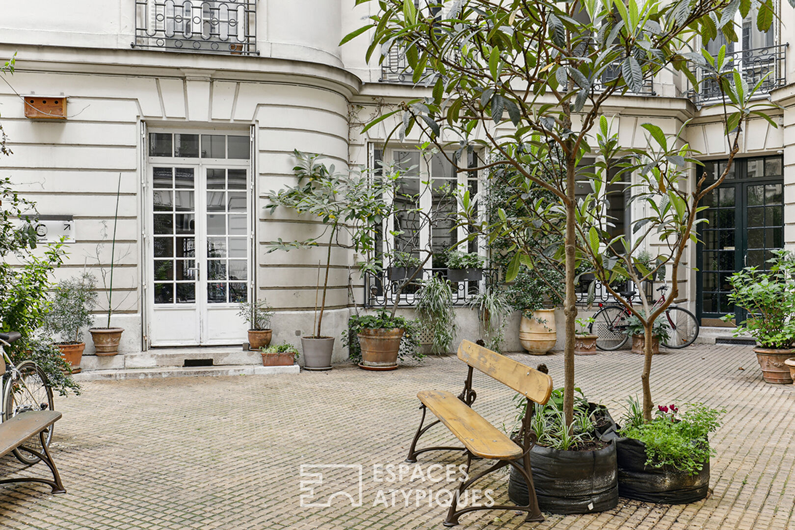 Loft d’habitation et local commercial avec verrière Eiffel proximité square d’Anvers