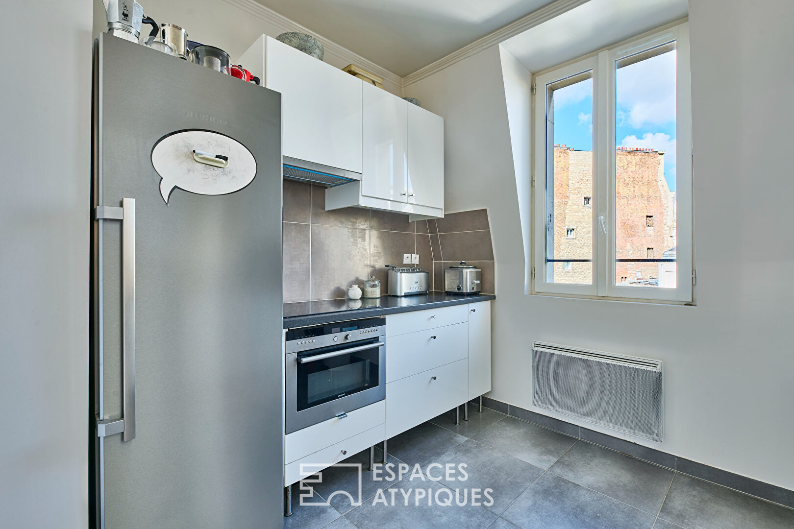 Artist’s loft on the top floor with painting storage room in SoPi