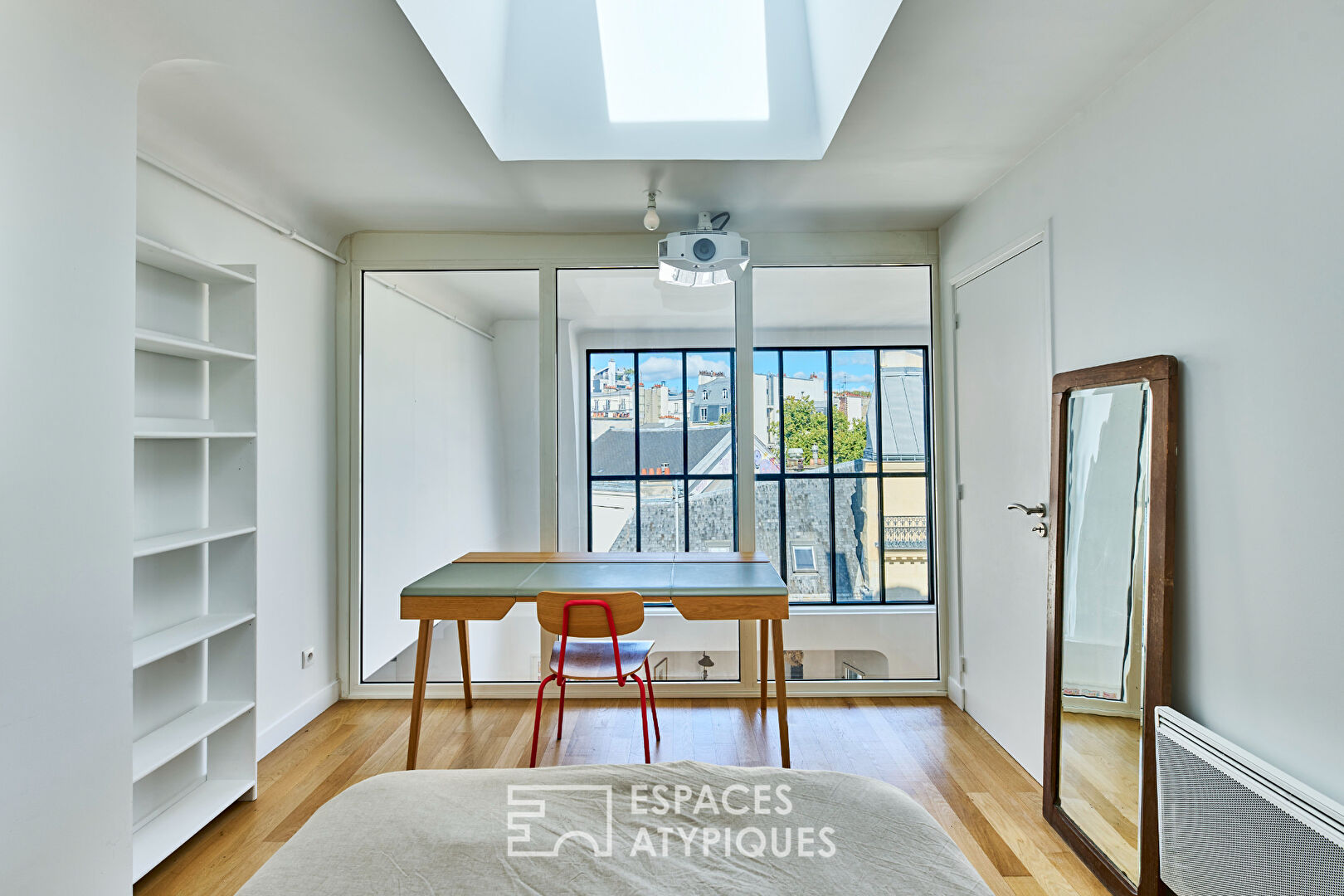 Artist’s loft on the top floor with painting storage room in SoPi