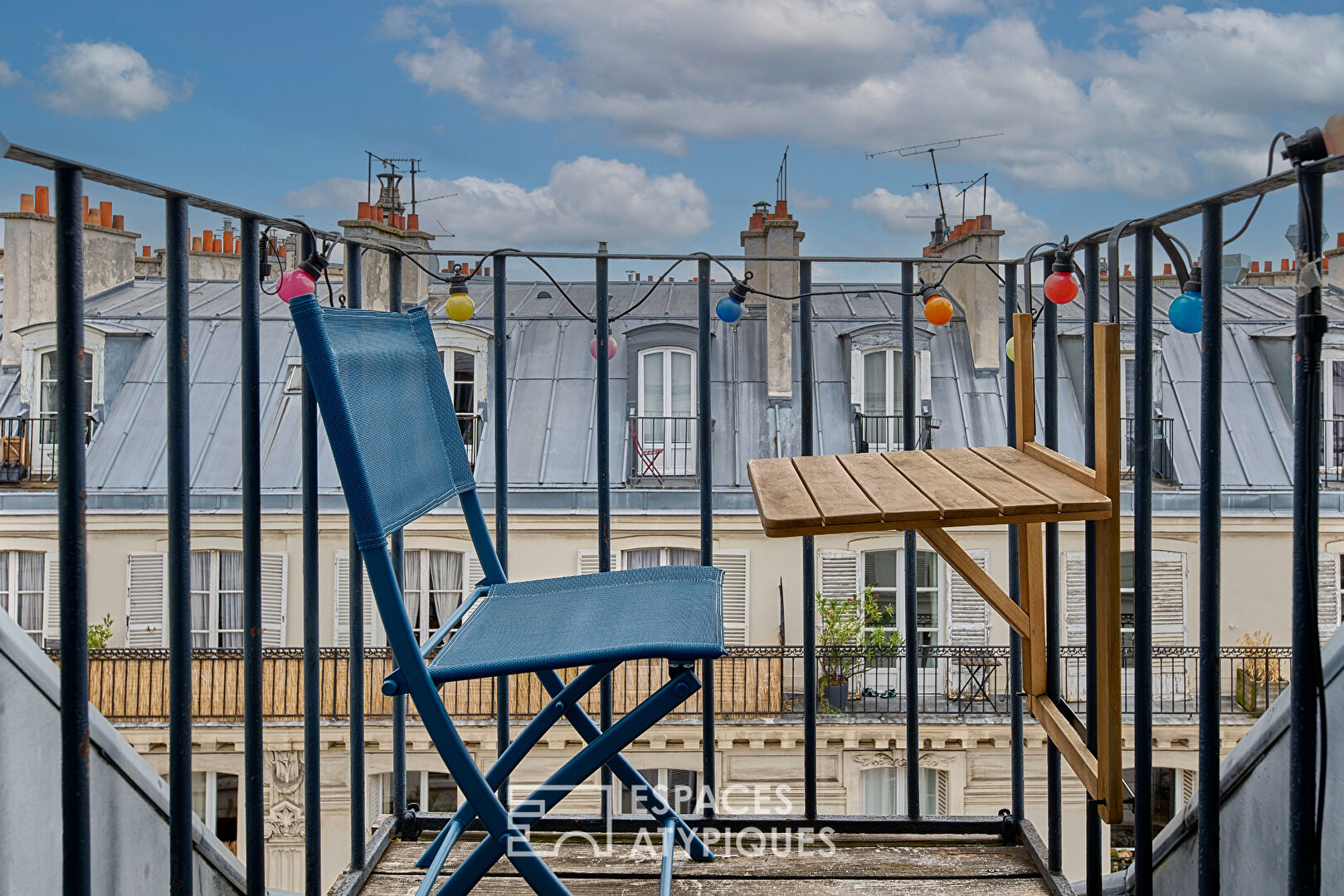 Dernier étage Montmartrois avec balcons et vues aux Abbesses
