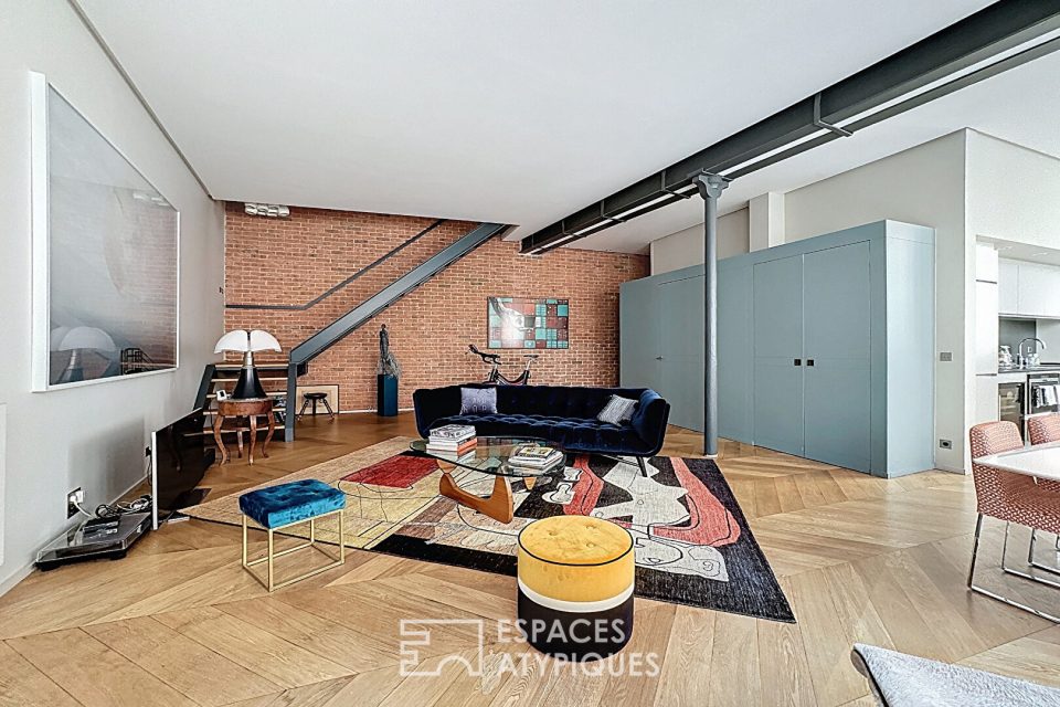 Duplex dernier étage esprit loft rénové par architecte proche Place des Victoires