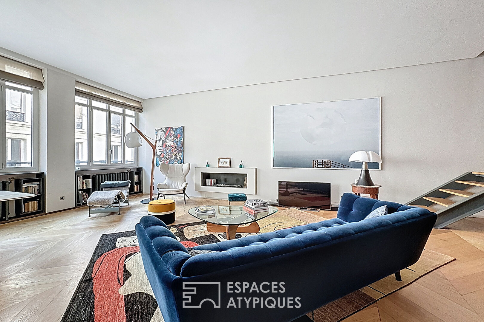 Duplex dernier étage esprit loft rénové par architecte proche Place des Victoires