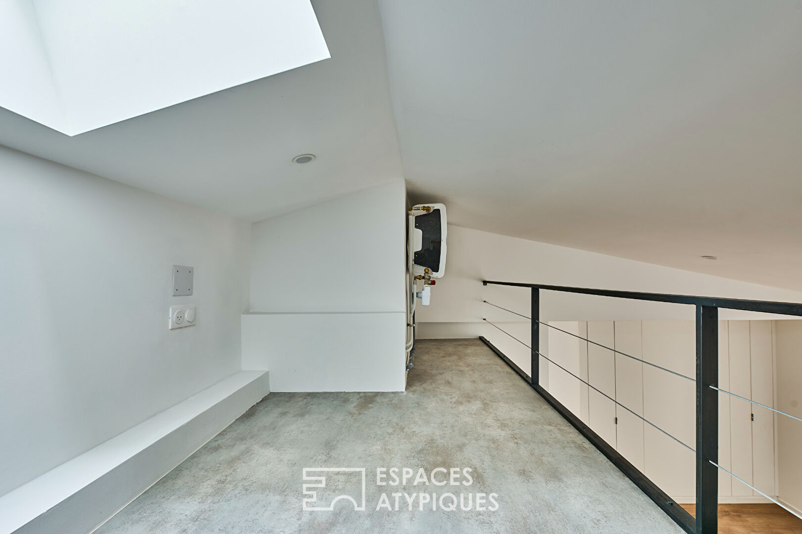 Appartement rénové par architecte en dernier étage aux Batignolles