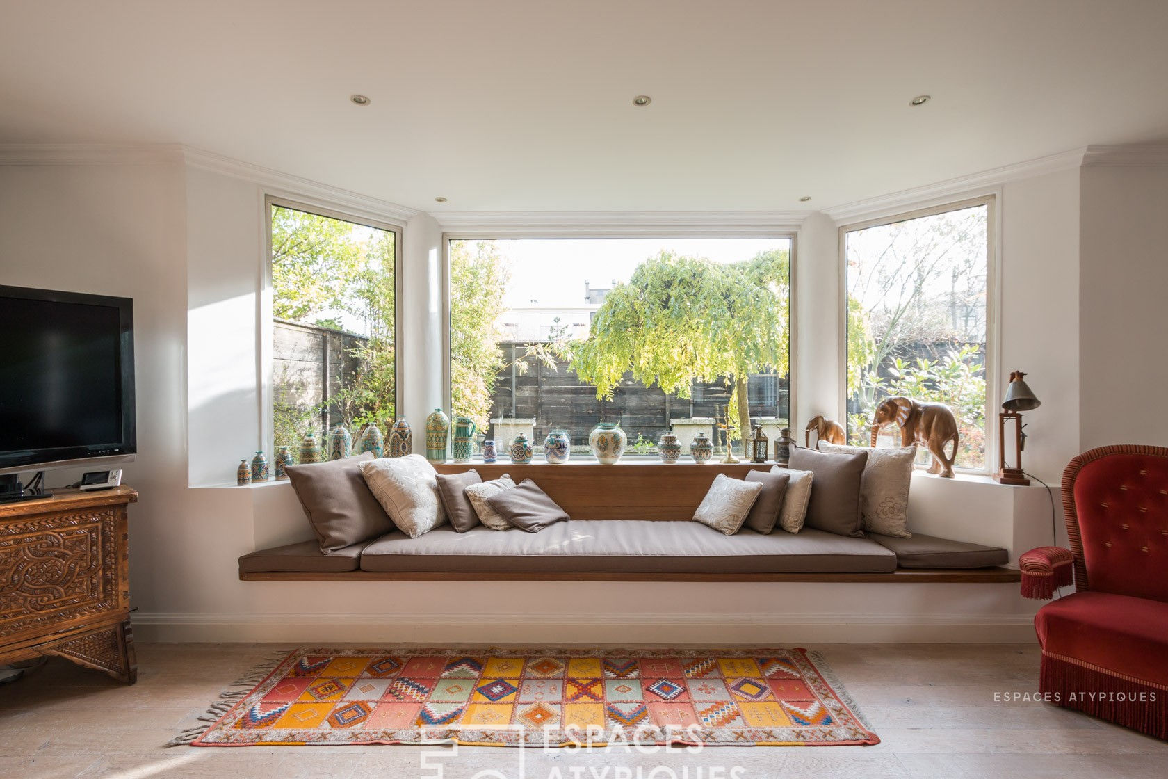 Duplex esprit maison avec terrasse et jardin