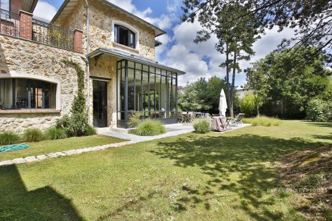 Contemporary brick and stone house