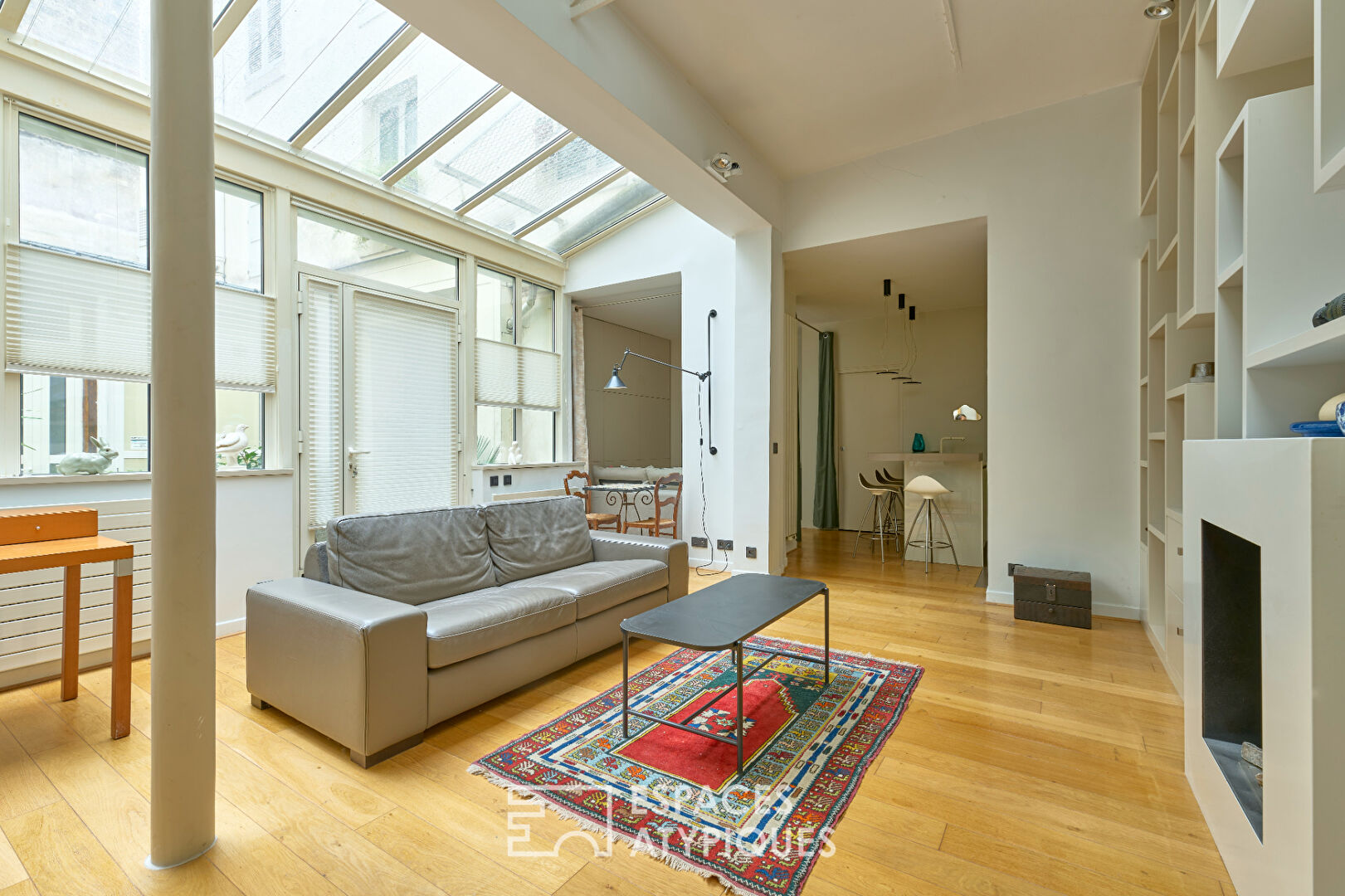 Ancien atelier de confection transformé en loft d’architecte – Marché Cadet