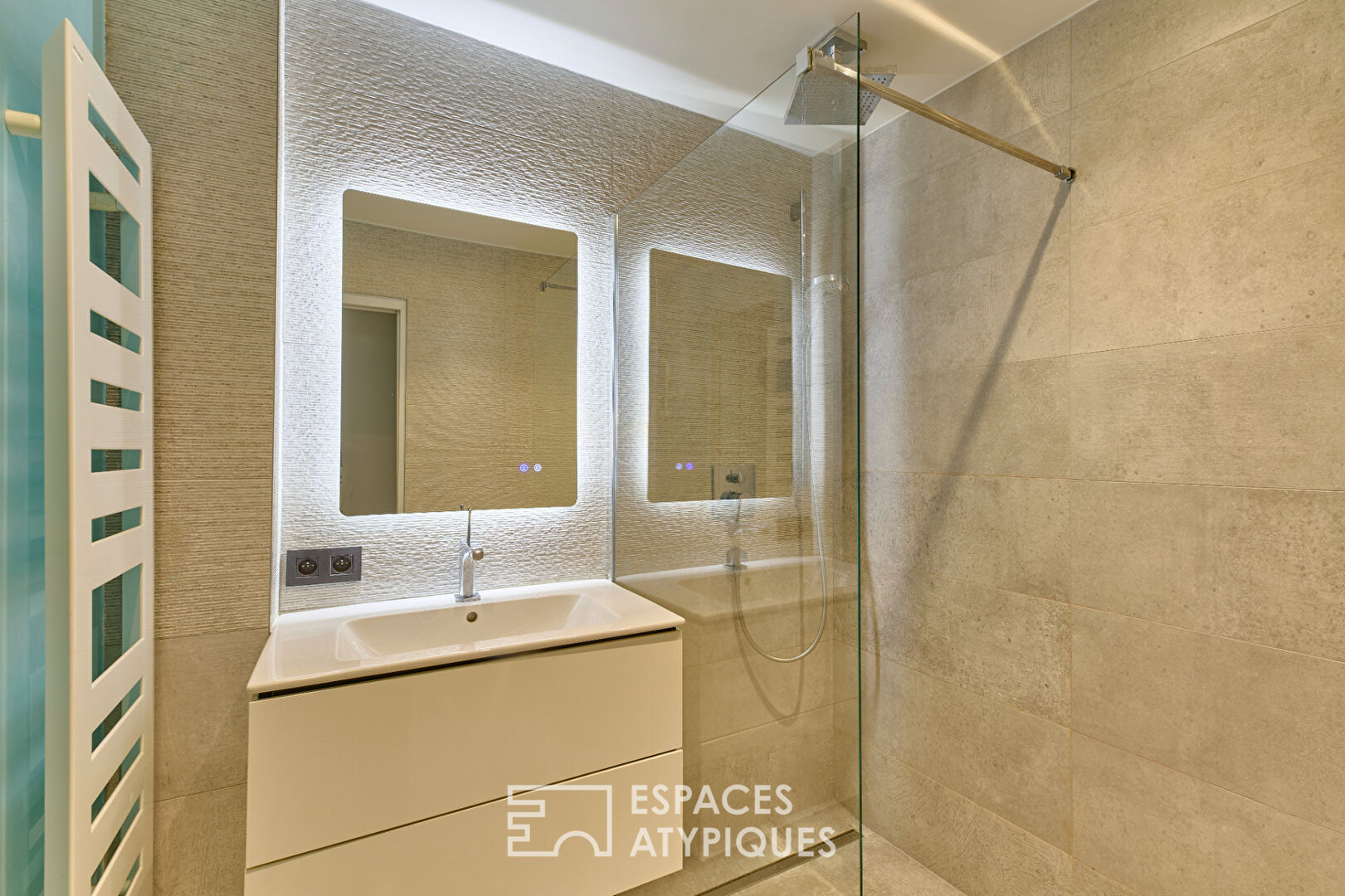 Ancien atelier de confection transformé en loft d’architecte – Marché Cadet