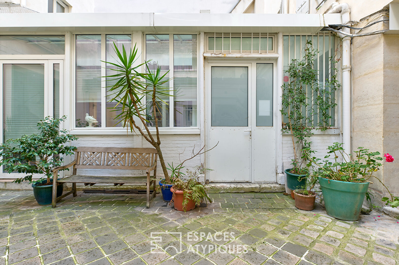 Ancien atelier de confection transformé en loft d’architecte – Marché Cadet