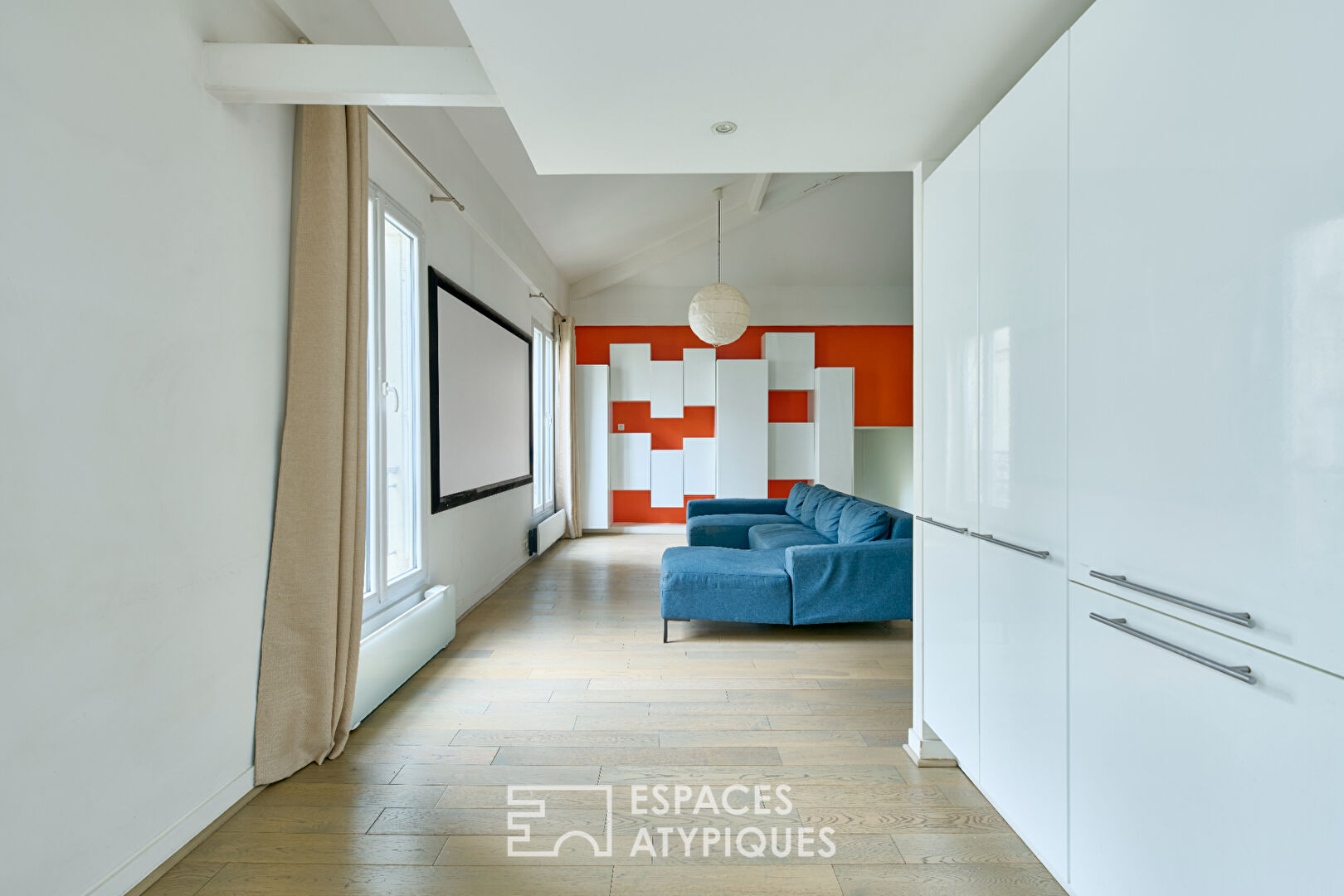 Dernier étage esprit loft design à Jules-Joffrin