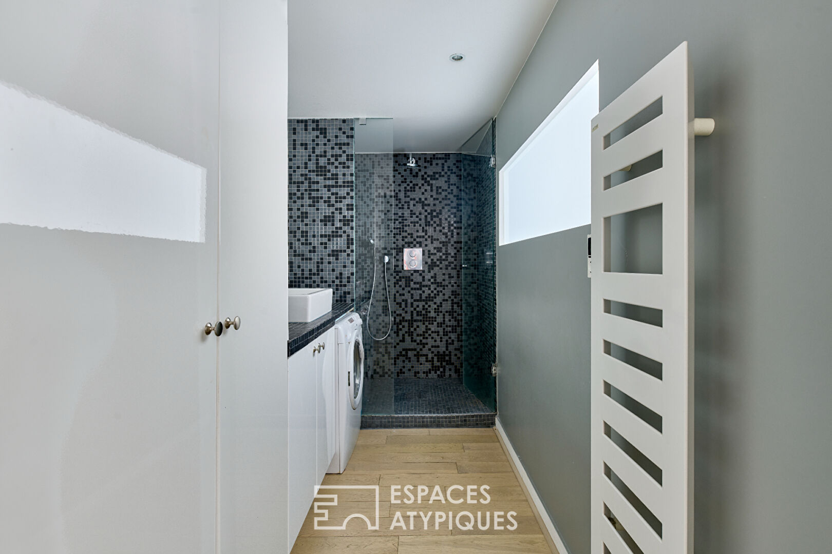 Dernier étage esprit loft design à Jules-Joffrin