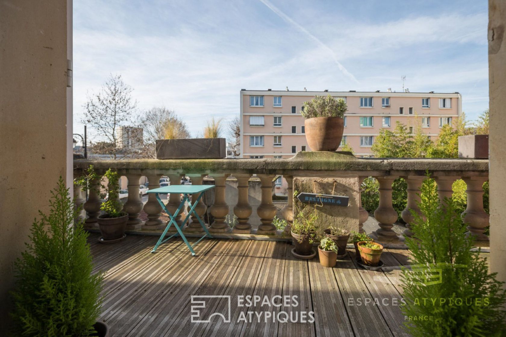 Duplex avec balcon-terrasse dans hôtel particulier