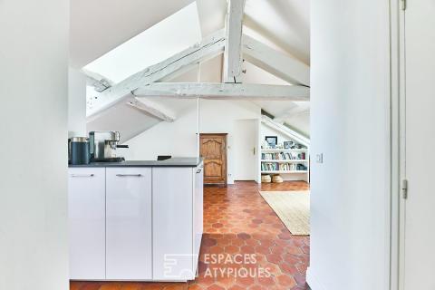 Top floor, with windows on both sides, in the heart of historic Paris