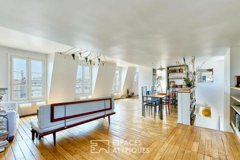 Top-floor duplex with windows on both sides – Martyrs district