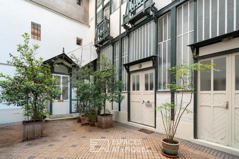 Ancien atelier d’artiste aménagé en duplex – Plaine Monceau