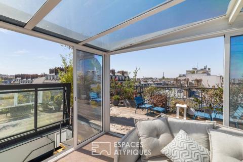 Duo d&rsquo;appartements, toit terrasse et vues au coeur des Batignolles