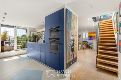 Duo d&rsquo;appartements, toit terrasse et vues au coeur des Batignolles