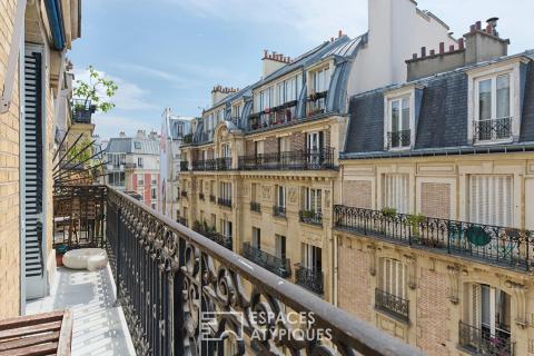 Haussmannian elevation with long balcony- Grandes-Carrières