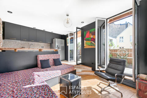Appartement traversant avec deux terrasses et sauna – Place du Tertre