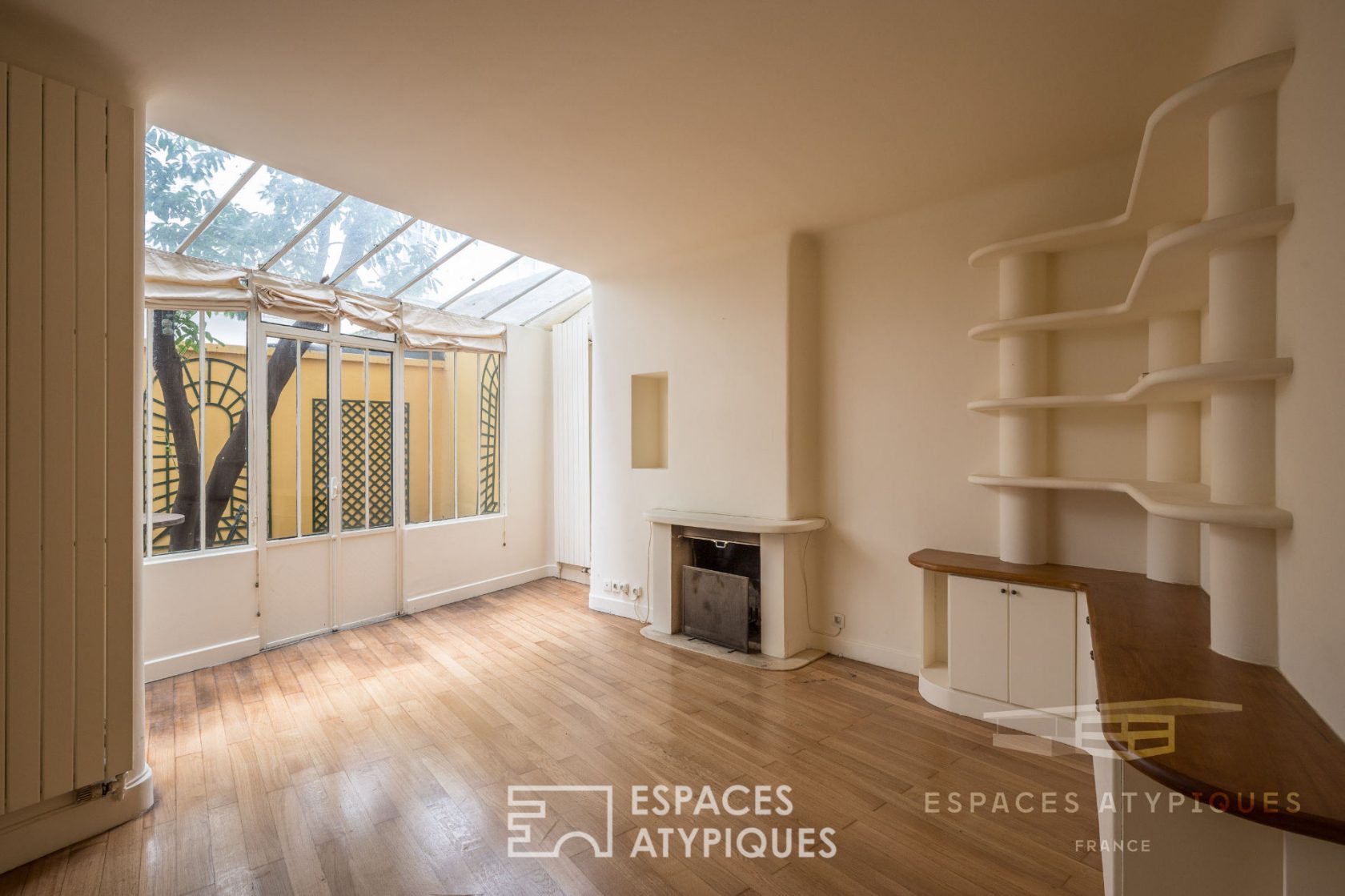 Duplex with glass roof and private courtyard with trees