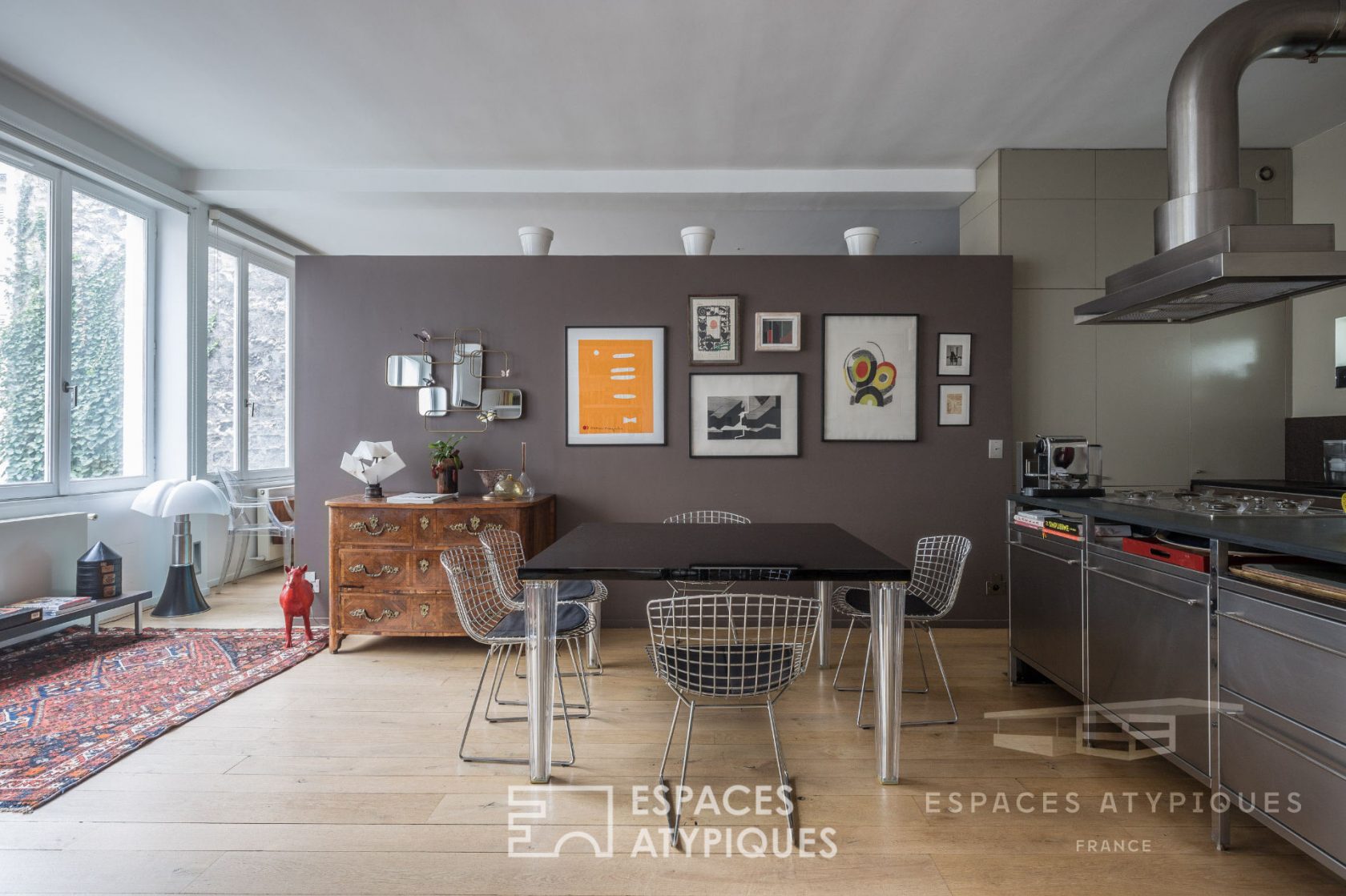 Loft with panoramic view on a garden