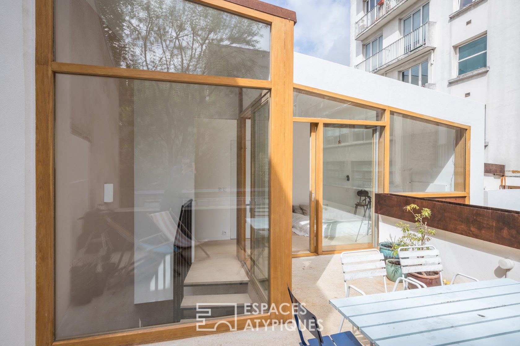 Contemporary house-style duplex with terraces