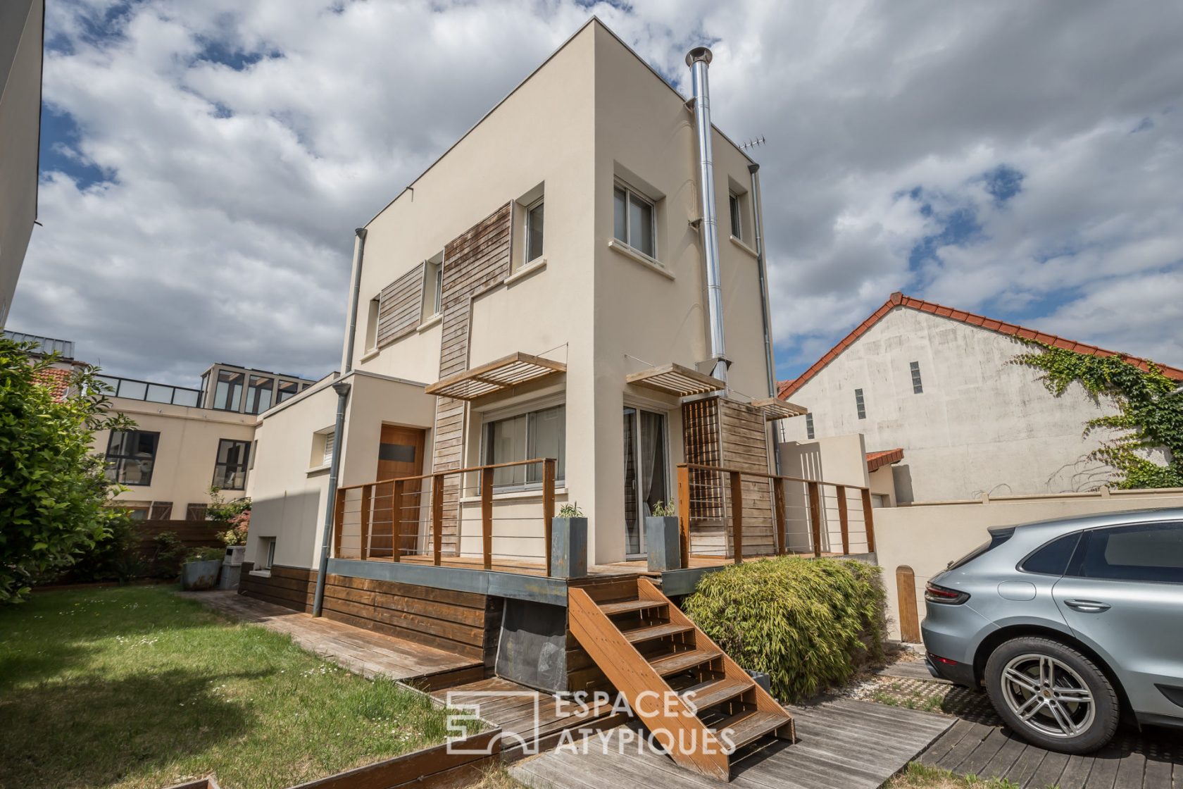 Maison contemporaine esprit bateau avec jardin et terrasses