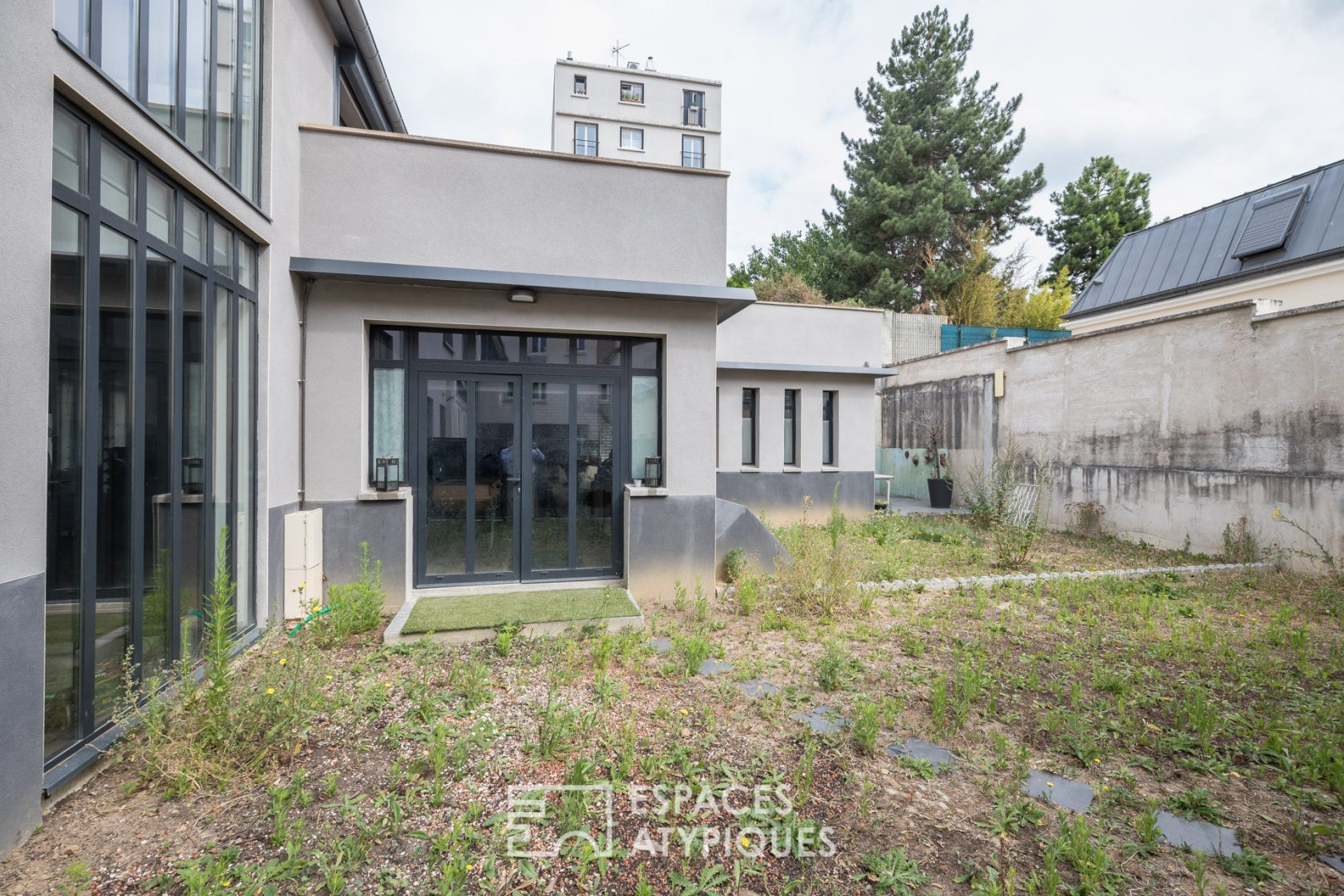 Loft esprit maison avec jardin et terrasse