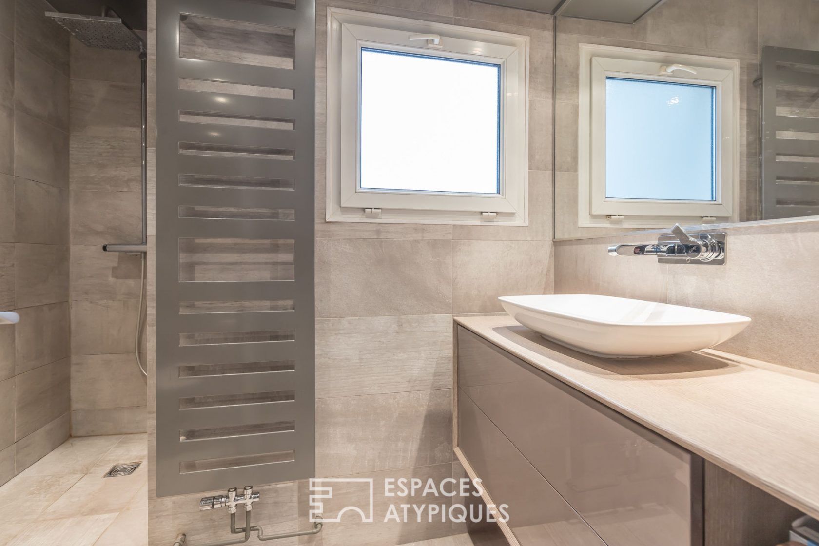 Duplex au dernier étage avec terrasses et vue sur Paris