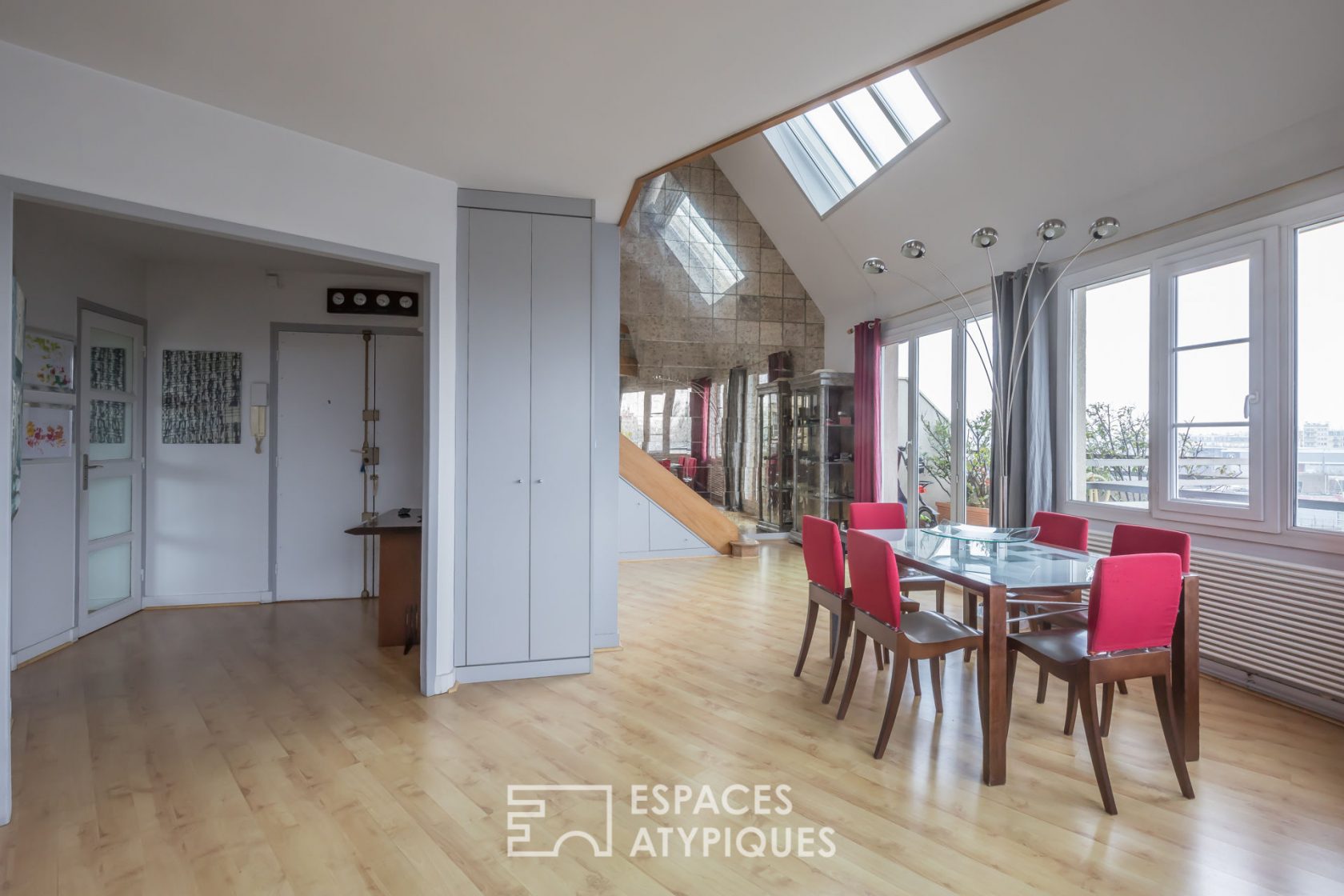 Duplex au dernier étage avec terrasses et vue sur Paris
