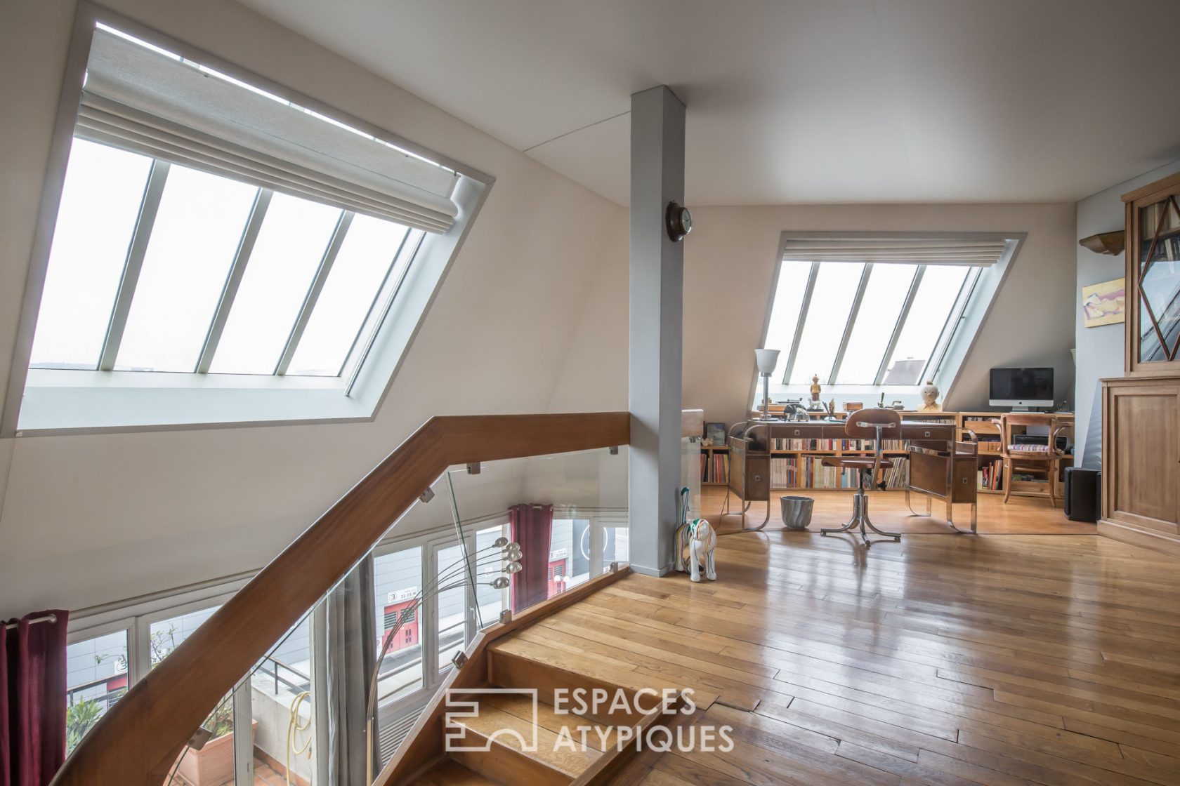 Duplex au dernier étage avec terrasses et vue sur Paris