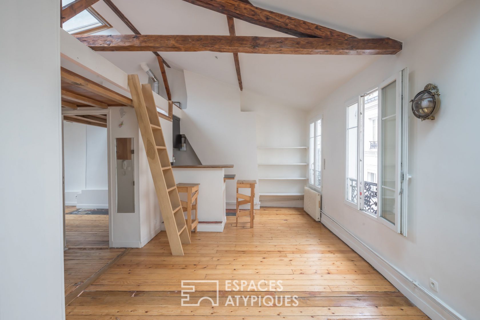 Top floor under the roof with a mezzanine