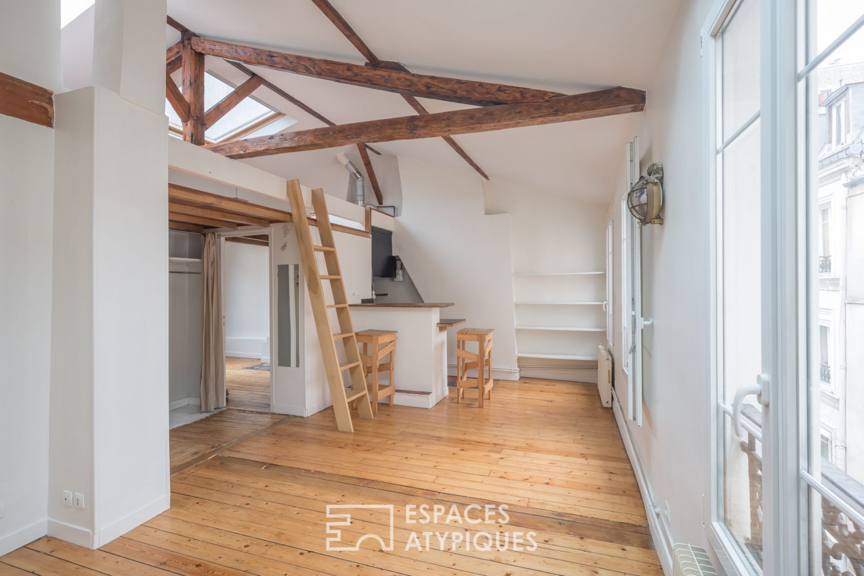 Top floor under the roof with a mezzanine