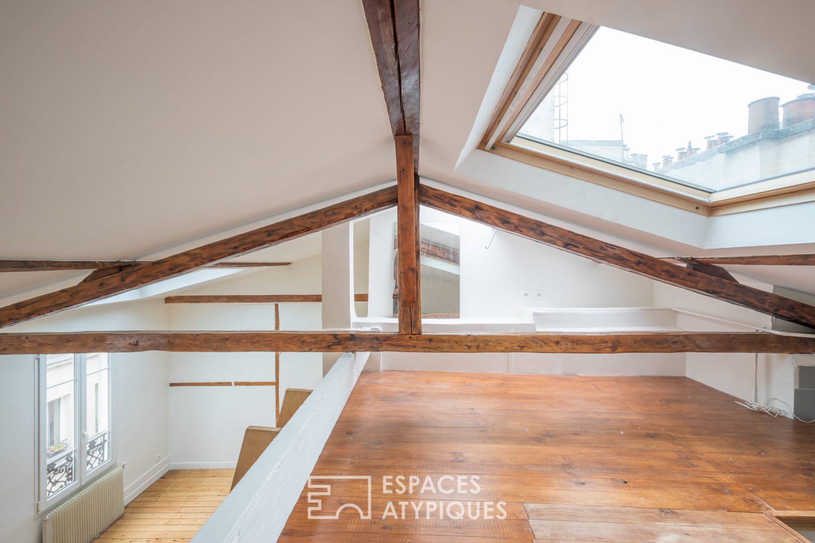 Top floor under the roof with a mezzanine