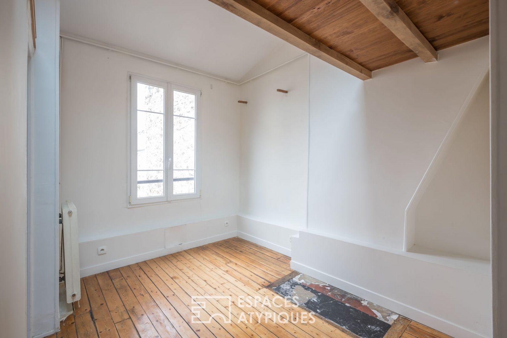 Top floor under the roof with a mezzanine