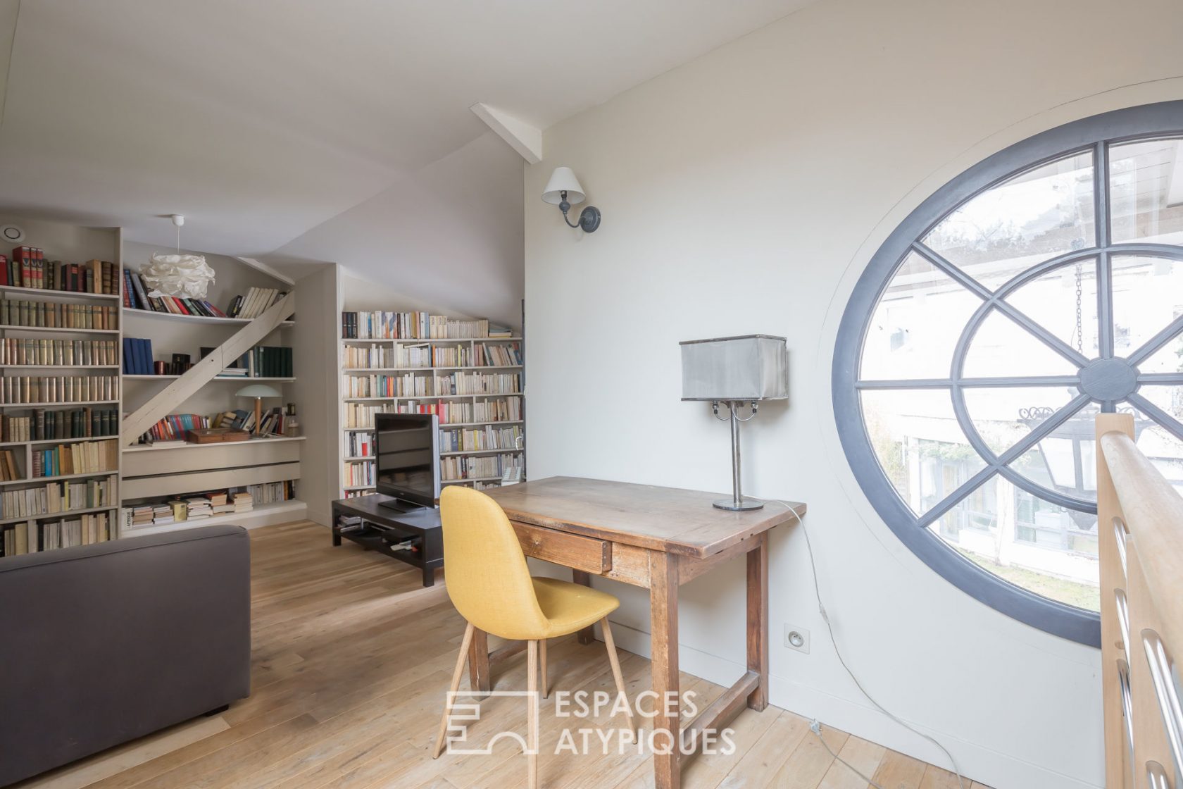 Former school revisited into a house with terrace and garden