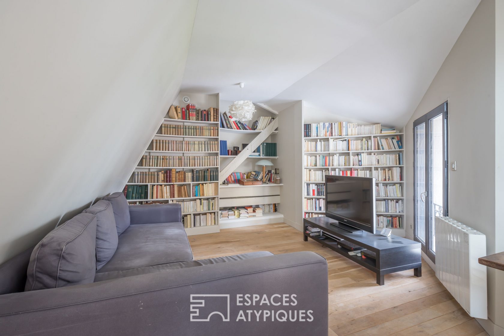 Former school revisited into a house with terrace and garden
