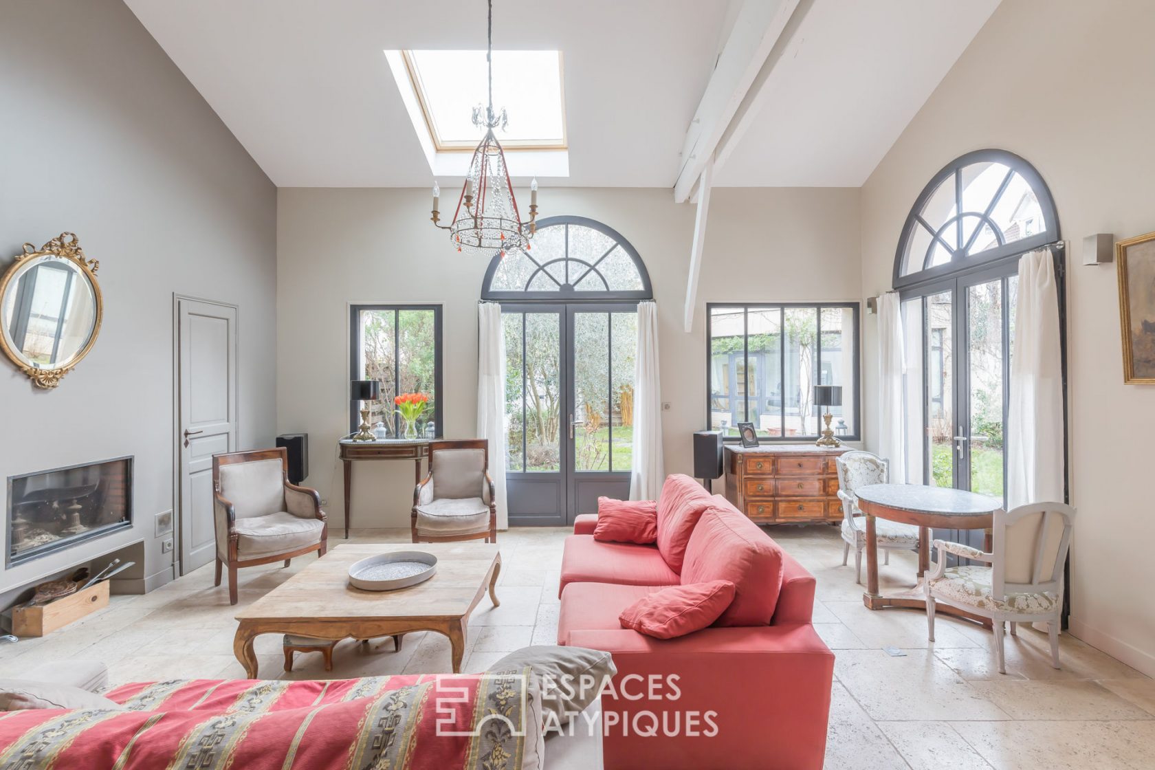 Former school revisited into a house with terrace and garden