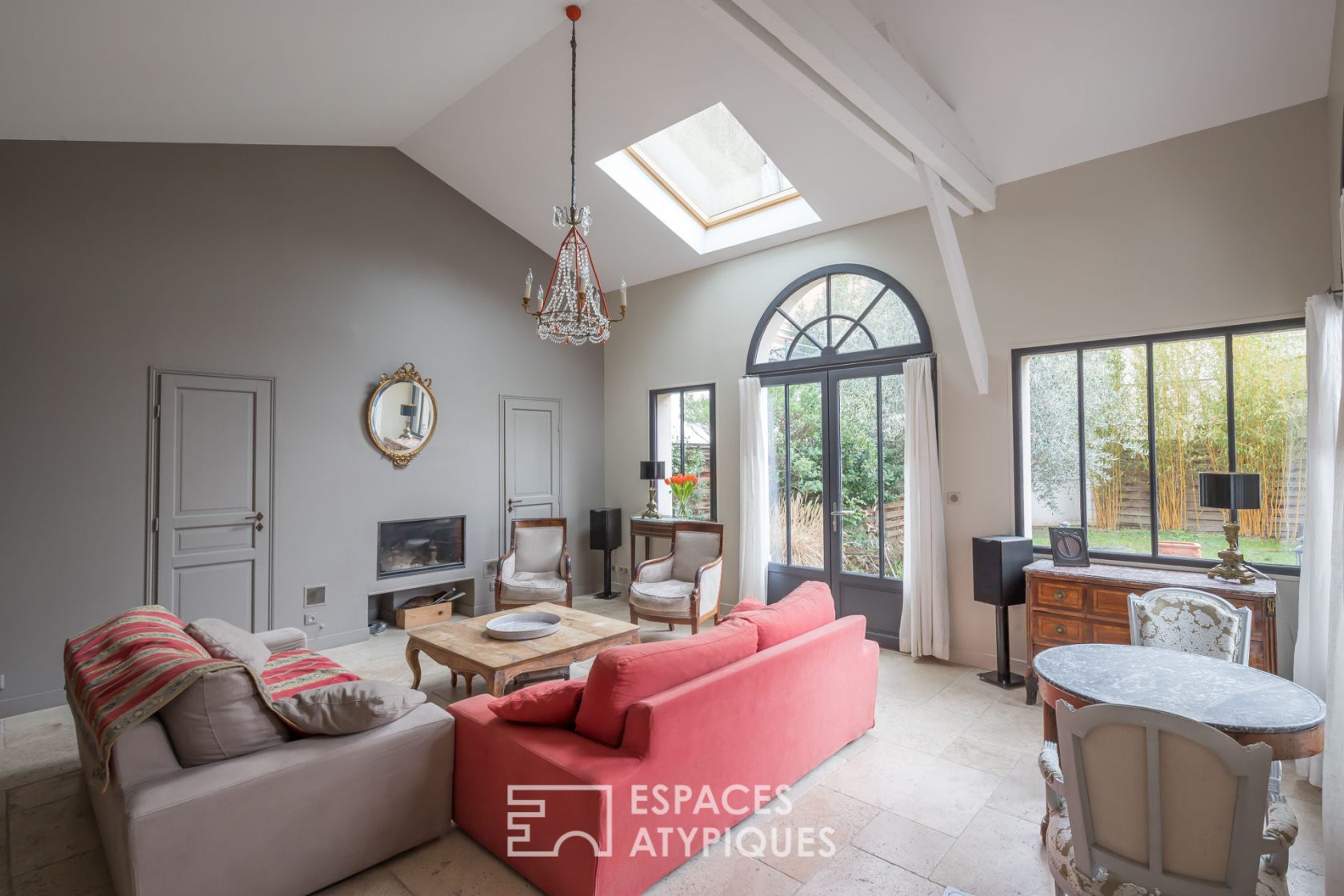 Former school revisited into a house with terrace and garden