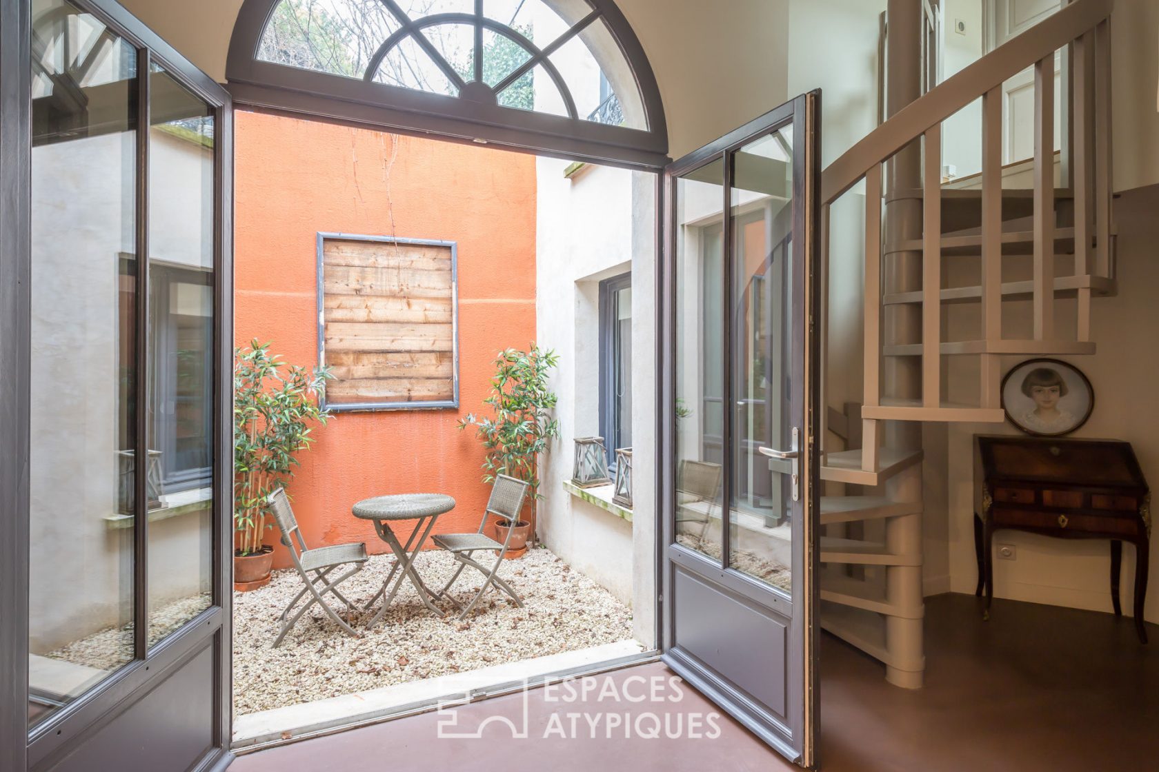 Former school revisited into a house with terrace and garden