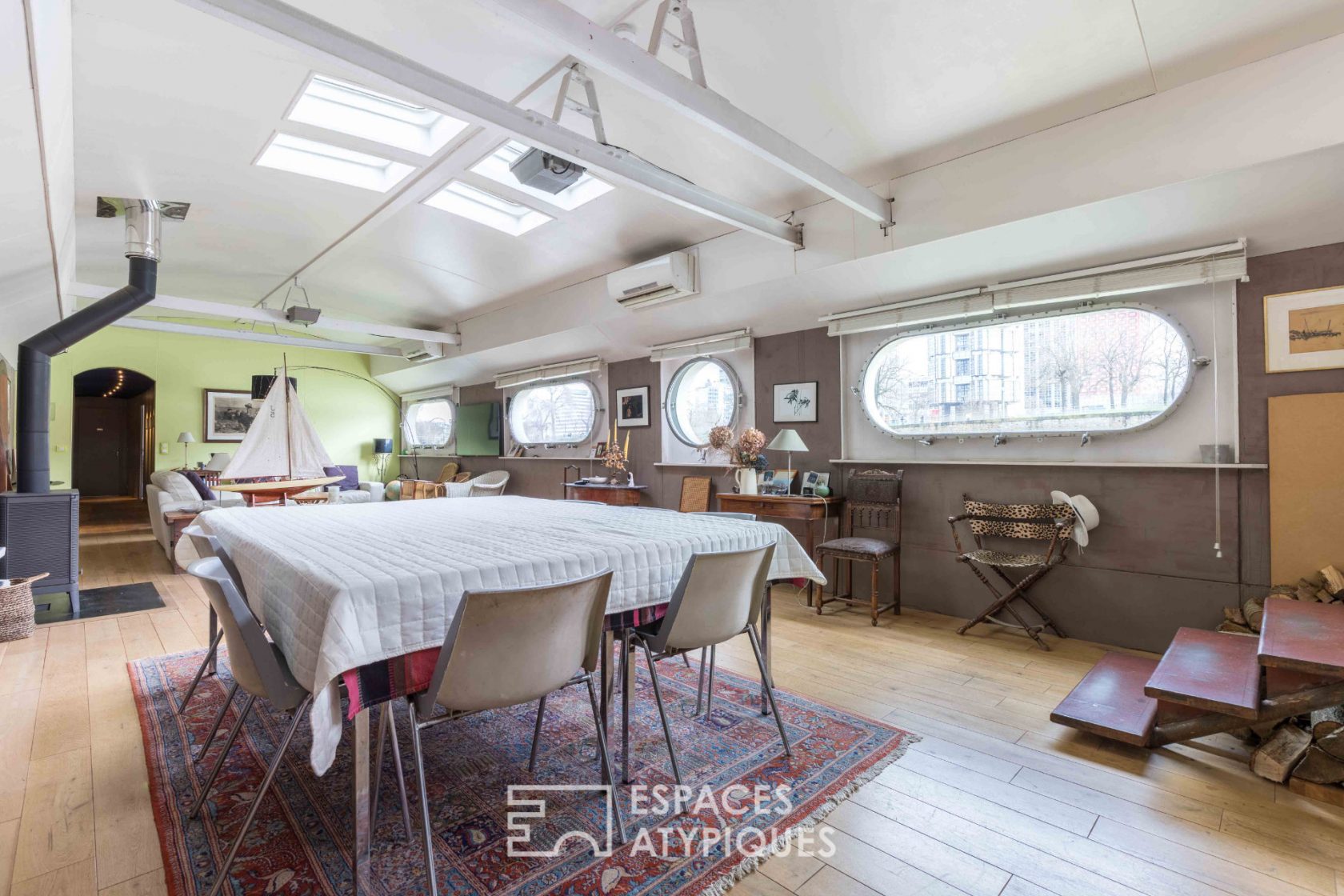 Barge with terrace and Eiffel Tower view