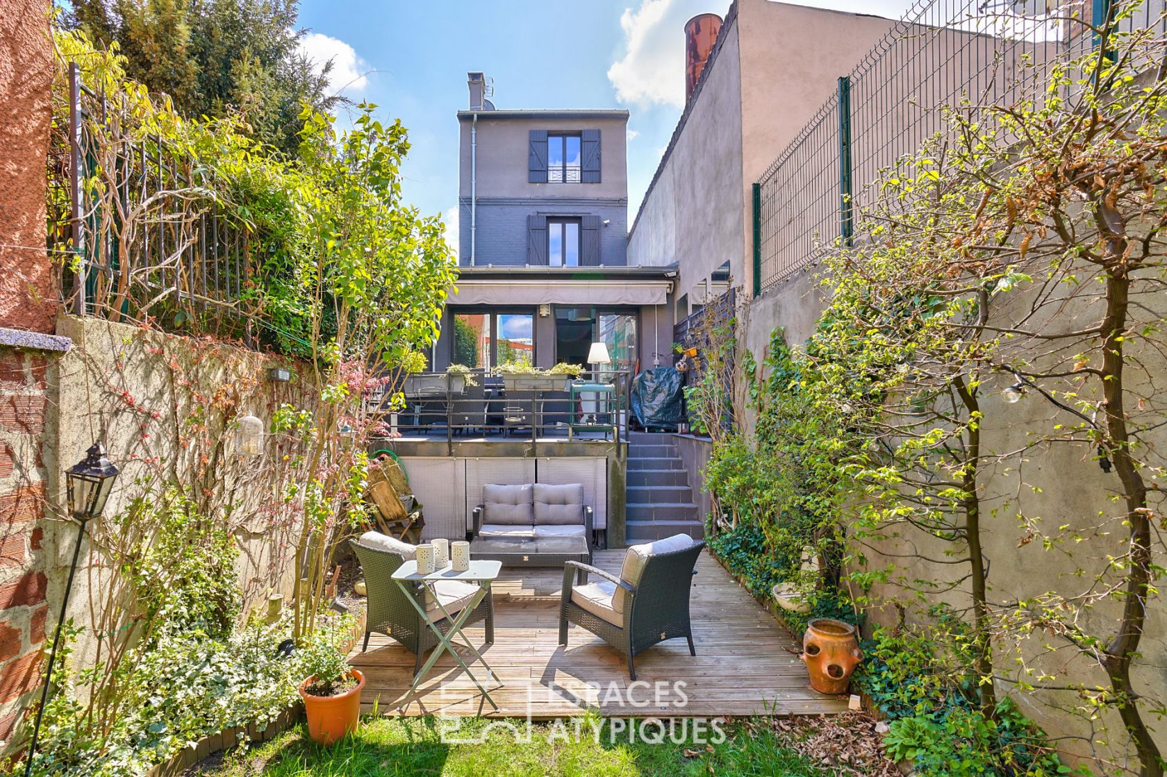 House with garden and open sky terrace
