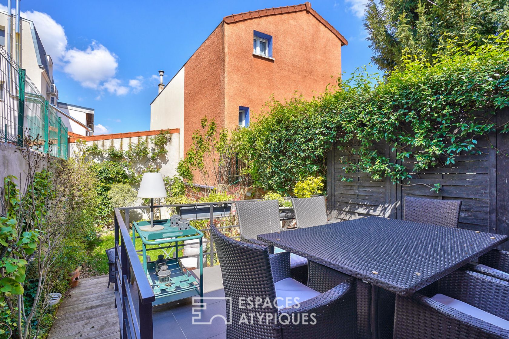 House with garden and open sky terrace