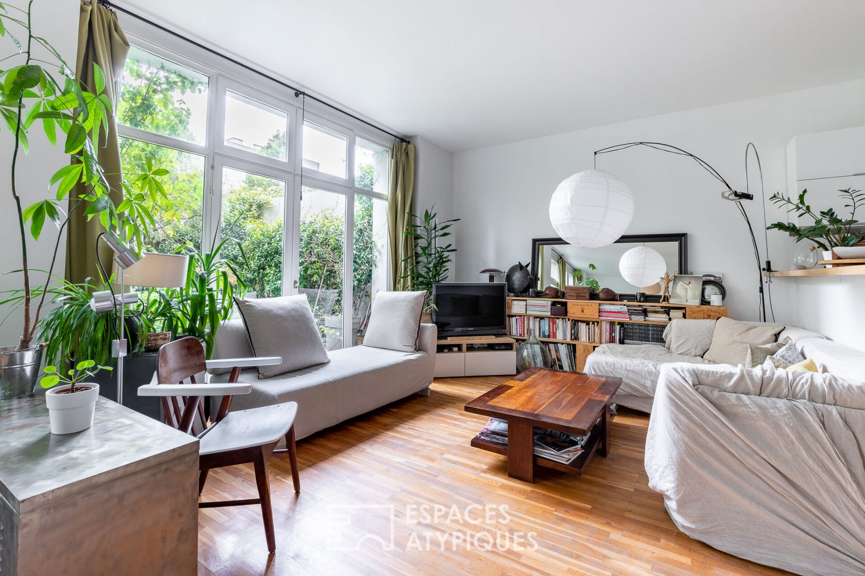 Appartement esprit loft avec jardin