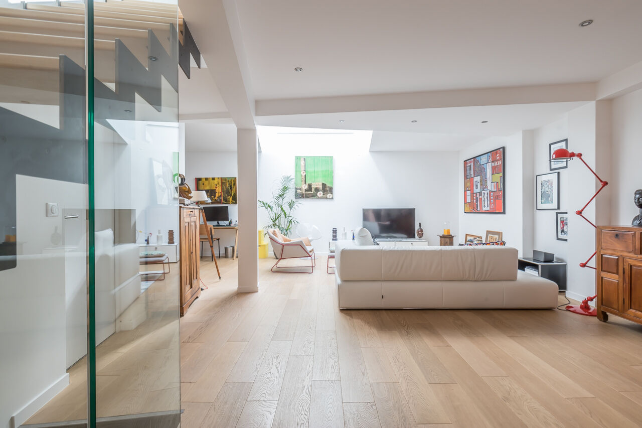 Loft-style triplex overlooking courtyard