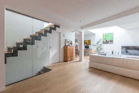 Loft-style triplex overlooking courtyard