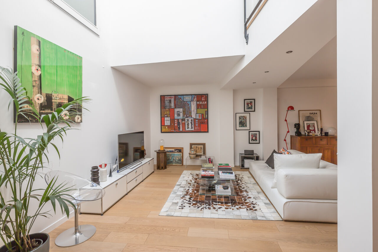 Loft-style triplex overlooking courtyard